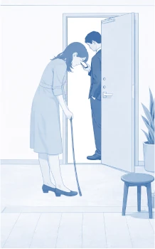 室内側から玄関を見た青系のミニマルイラスト。手前で女性がロング靴ベラを使って立ったまま靴を履き、奥の半開きの玄関では男性がスマートフォンを見ながら立っている。